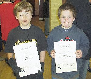 Youth Club Sponsored Run - 27 January 2007 - Two participents, Sam and Josh, with their certificates. Sam and Josh were also winners in the 2006 Scarecrow Competition.